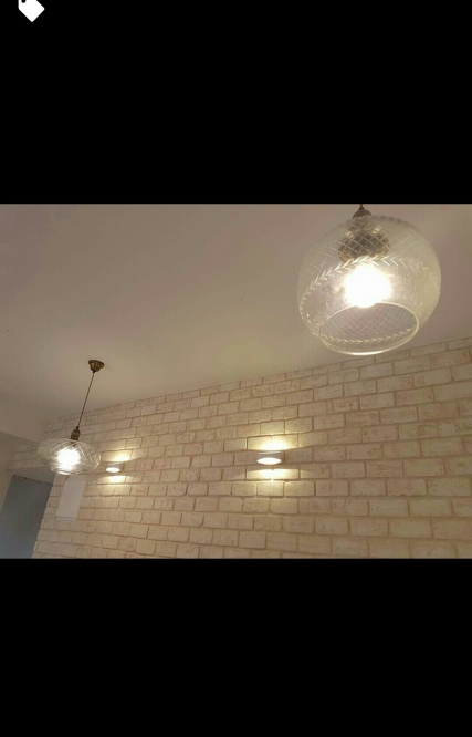 צילום מעבודה של קובי איבגי