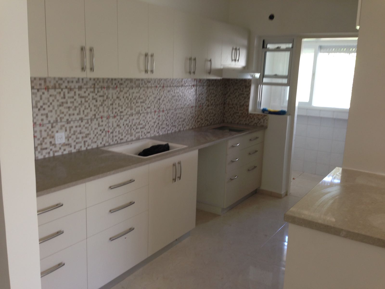 צילום מעבודה של אשר בוסקילה