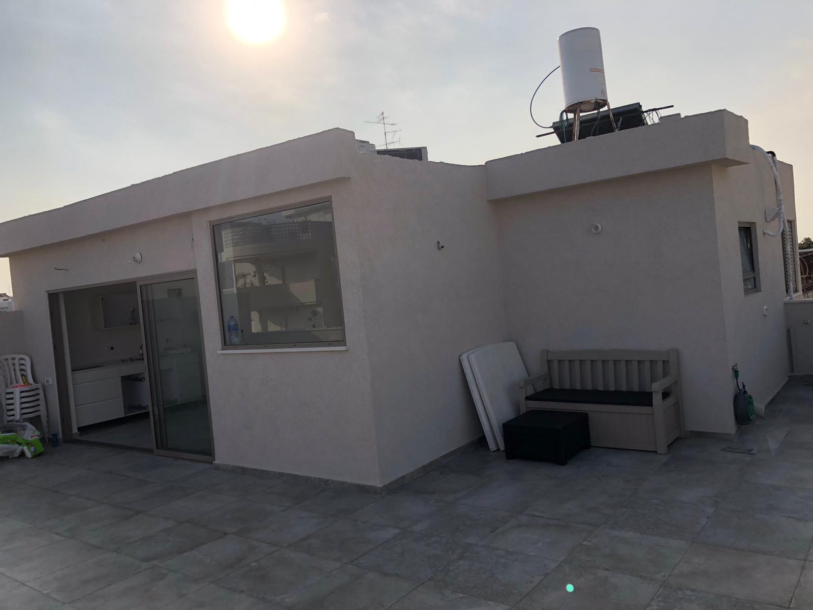 תוספת בניה שני חדרים על גג