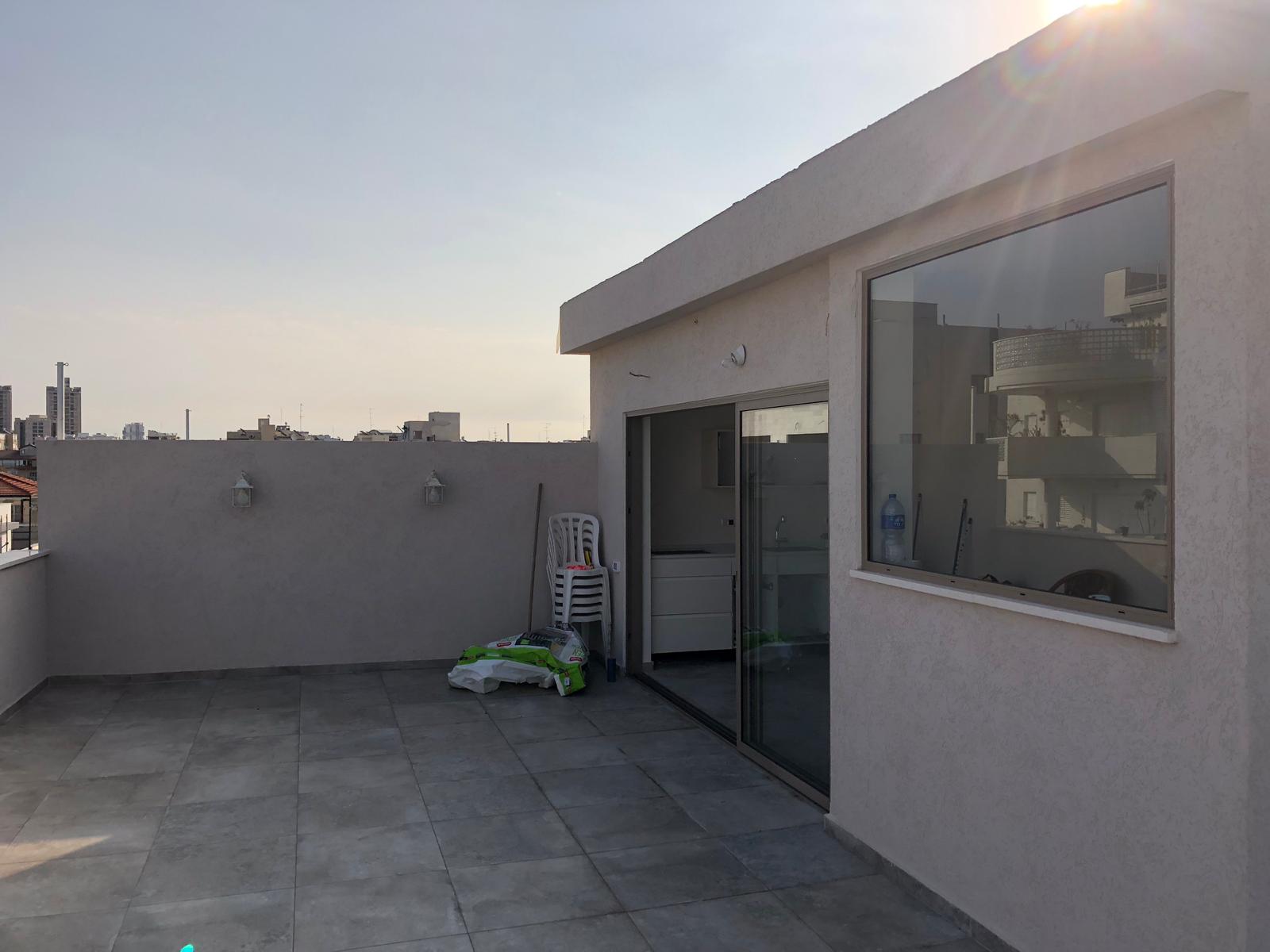 תוספת בניה שני חדרים על גג