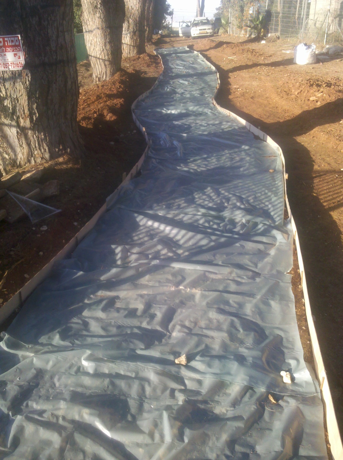 יציקת מדרכה 200 מטר - נצר סרני