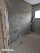 התזת בטון על קיר פנימי