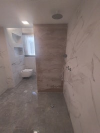 שיפוץ כללי למקלחת+ יציקת בטון וריצוף חוץ +חשמל ושליכט צבעוני לקיר חוץ