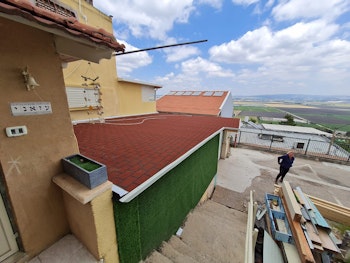 חיפוי גג ביריעות שינגלס